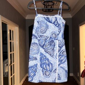 Lilly Pulitzer Romper size 2. Back Zip with adjustable straps. Blue Shells Beach